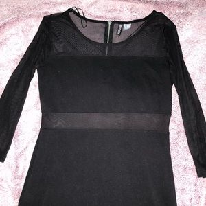 Black long sleeves dress.